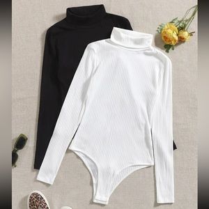 Two Turtleneck onesies